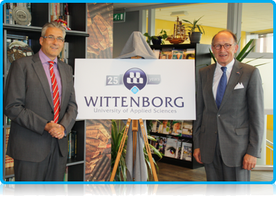 Mr. Fred de Graaf, President of the Senate of the Netherlands’ Dutch Parliament reveals Wittenborg University’s 25th Anniversary logo