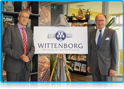 Mr.-Fred-de-Graaf-President-of-the-Senate-of-the-Dutch-Parliament-reveals-Wittenborg-University’s-25th-Anniversary-logo
