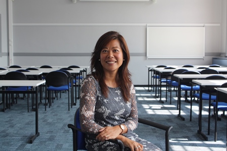 Director Maggie Feng in a classroom at the new Spoorstraat location of Wittenborg University