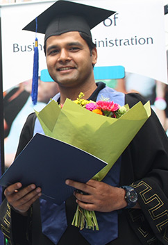 Graduate from Nepal Impresses With "Knock-Out" Dissertation and Determination