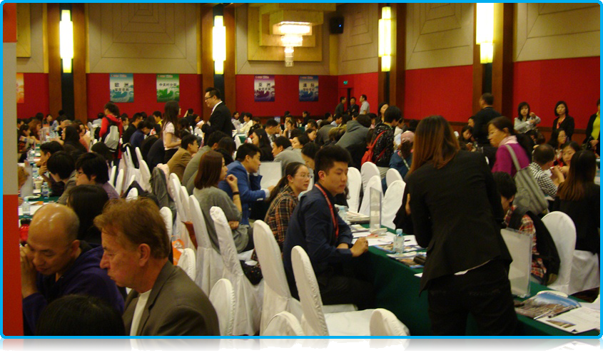 Students at an agency fair in Beijing 