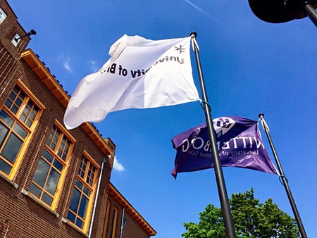 Wittenborg and University of Brighton Flags fly at the Spoortstraat Building, Apeldoorn Campus