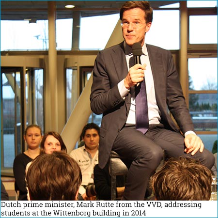 Dutch prime miniter, Mark Rutte from the VVD, addressing students at the Wittenborg building in 2014