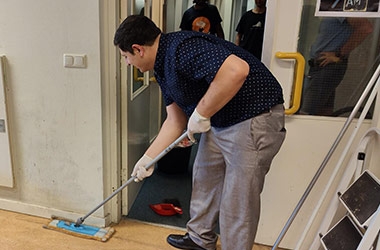 Wittenborg Directors and Office Staff Pitch in to Clean De Ruyterstraat Dorms 