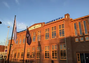 From Catholic Boys' School to International Business School: The History of the Spoorstraat Location