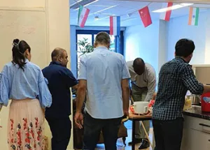 Wittenborg Directors and Office Staff Pitch in to Clean De Ruyterstraat Dorms 