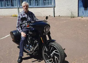 WUAS Trustee, Finance and Quality Manager Shares Unconditional Love for his Harley-Davidson