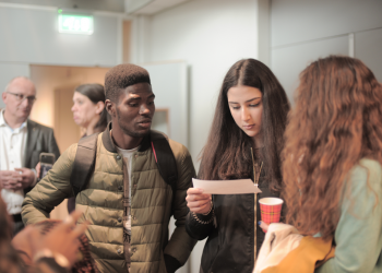 An international group of students ready to learn abroad in the Netherlands.